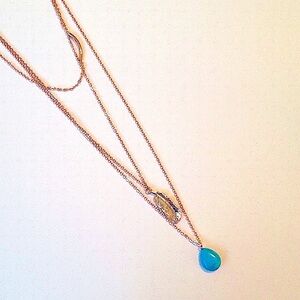 women's gold tone charm necklave with turquoise color stone